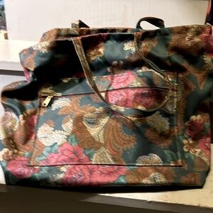 Large weekend duffle bag comes with small bags made by Holdings Fine Accessories